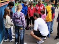 Artem teaches children to play